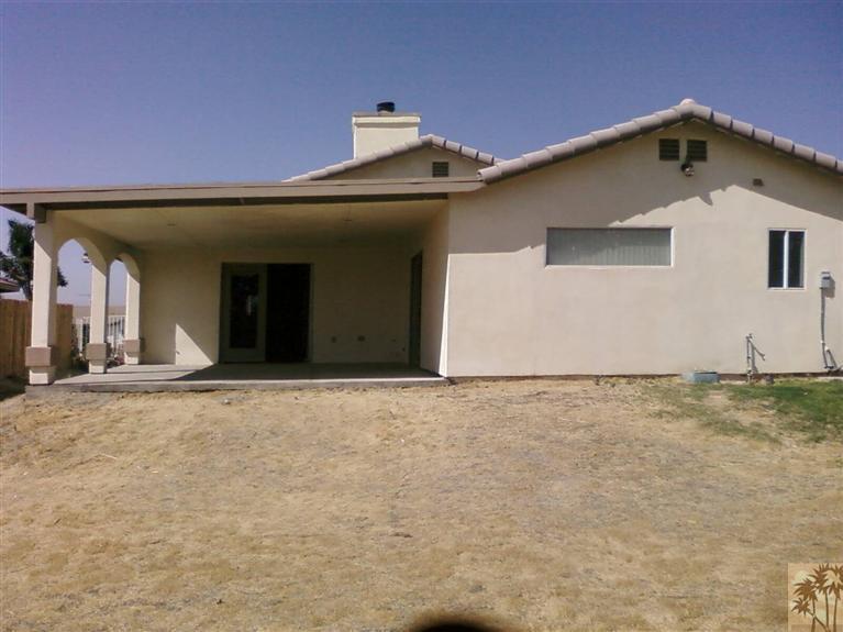 13700 El Rio Lane Desert Hot Springs, CA 92240 - Photo 8 of 9 a view of a house with a outdoor space
