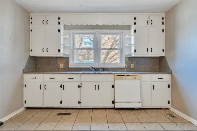 a view white cabinets with granite countertop white cabinets