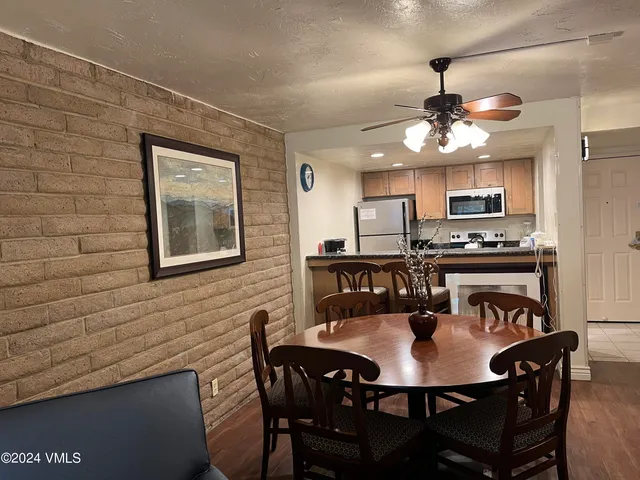 a view of a dining room with furniture