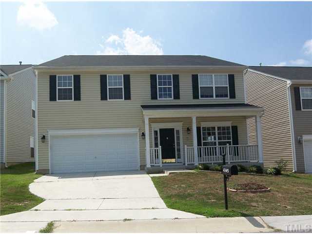 4345 Karlbrook Lane Raleigh, NC 27616 - Photo 1 of 12 a front view of a house with garage