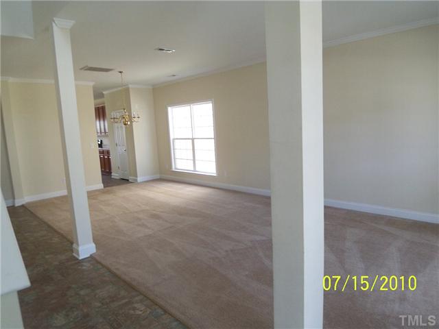 4345 Karlbrook Lane Raleigh, NC 27616 - Photo 2 of 12 a view of an empty room with a window