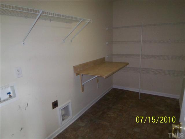 4345 Karlbrook Lane Raleigh, NC 27616 - Photo 8 of 12 a view of storage and utility room