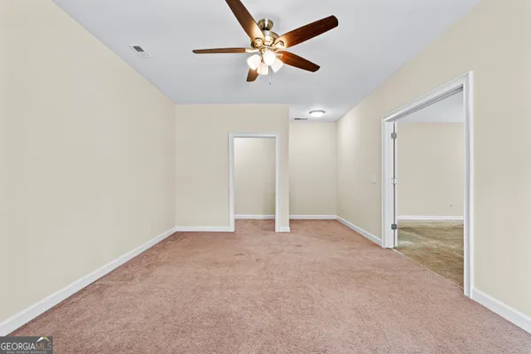 a bathroom with a sink a vanity a mirror and a shower