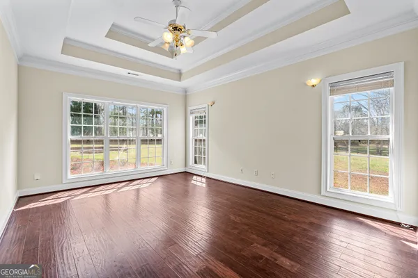 a bathroom with a tub shower and sink