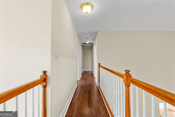 a bathroom with a double vanity sink and mirror