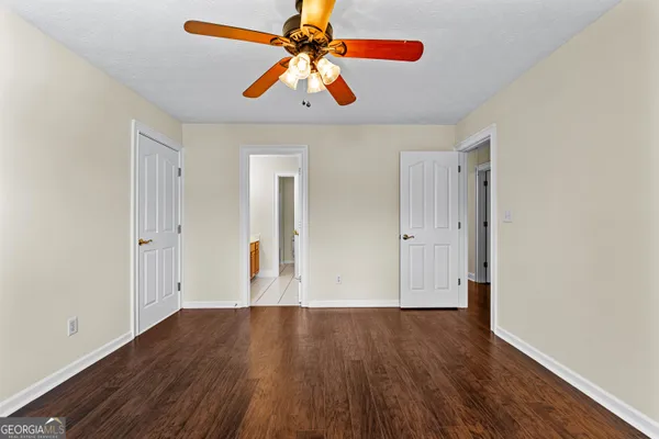 a view of a swimming pool with an outdoor space and seating area
