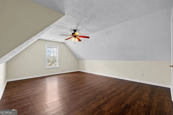 a view of a backyard of the house