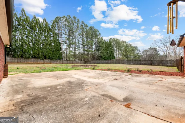 a house view with a garden space