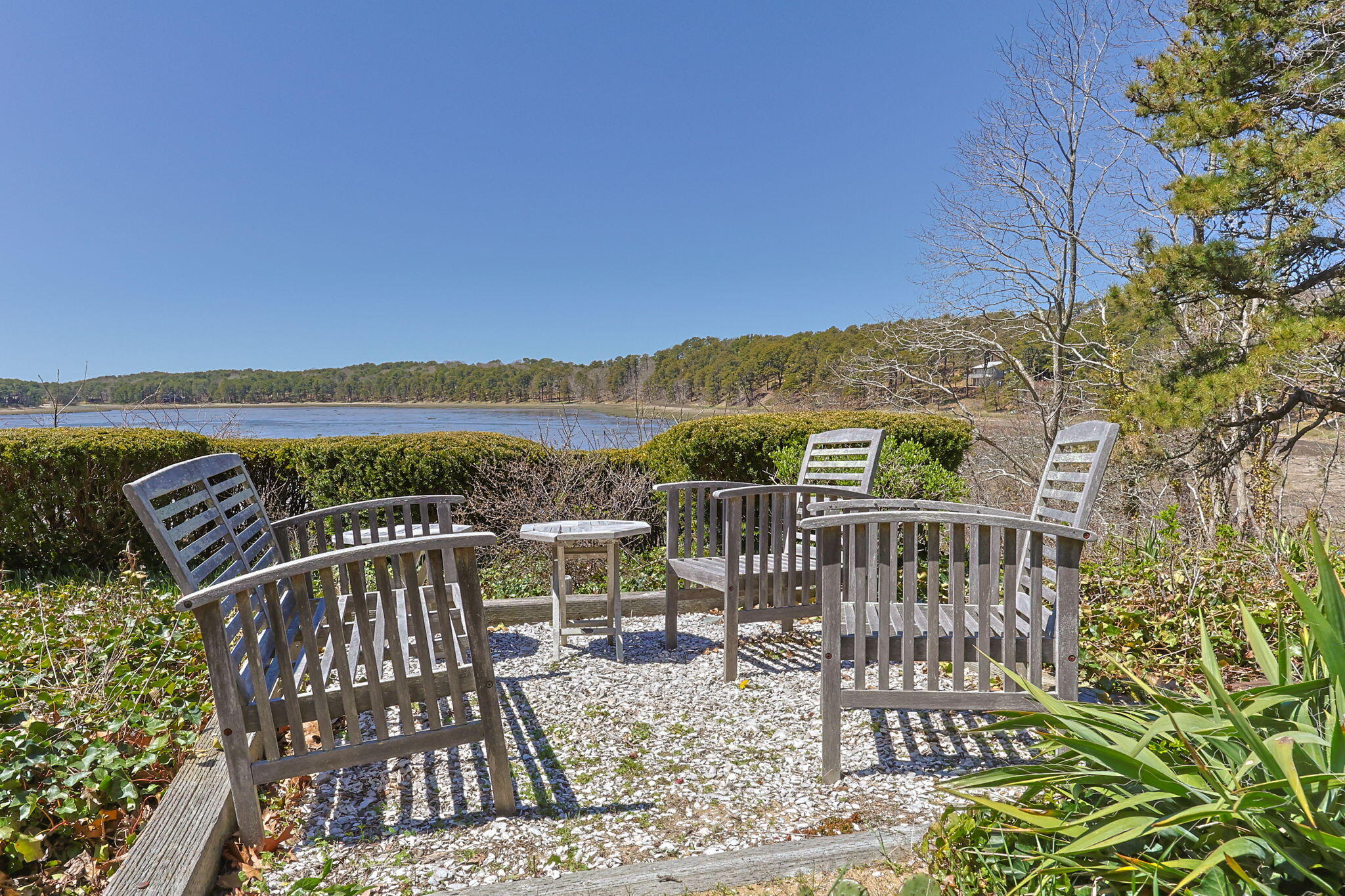 60 Long Avenue, Unit A Wellfleet, MA 02667 - Photo 23 of 28 a view of a chairs and table on the terrace