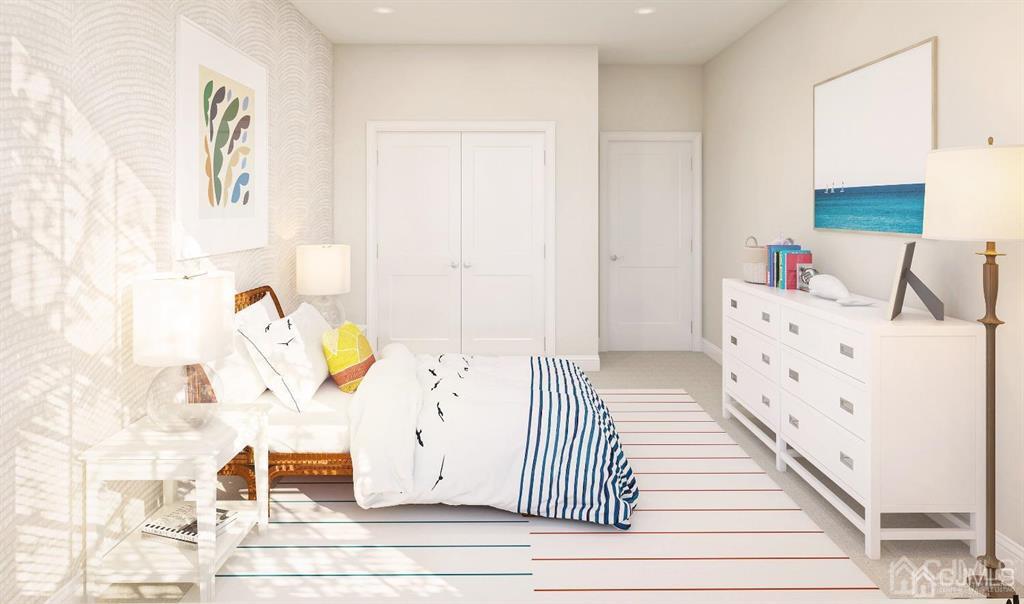 734 Station Road, Unit 512 Dunellen, NJ 08812 - Photo 4 of 6 a view of a bedroom with wooden floor and windows