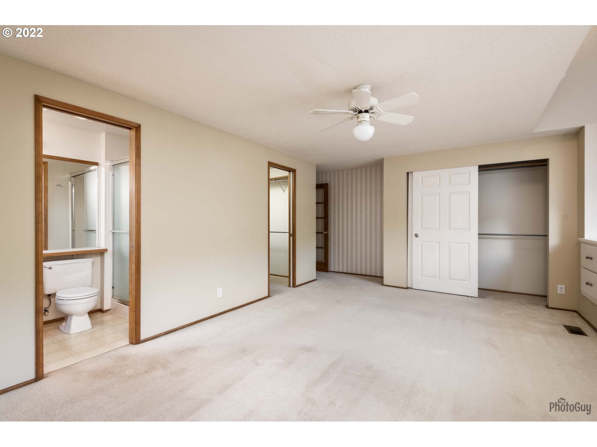589 Granite Place Springfield, OR 97477 - Photo 14 of 31 a view of an empty room with a ceiling fan