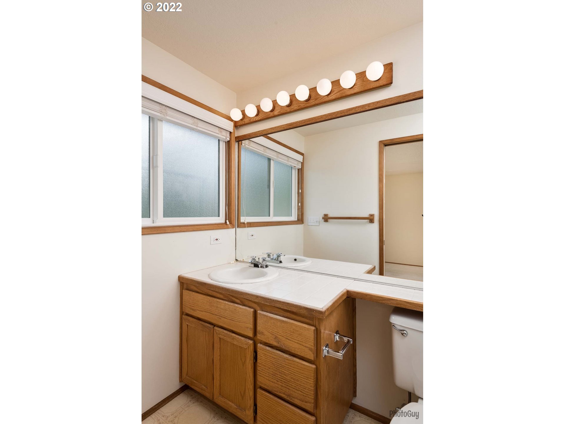 589 Granite Place Springfield, OR 97477 - Photo 15 of 31 a bathroom with a sink and a mirror