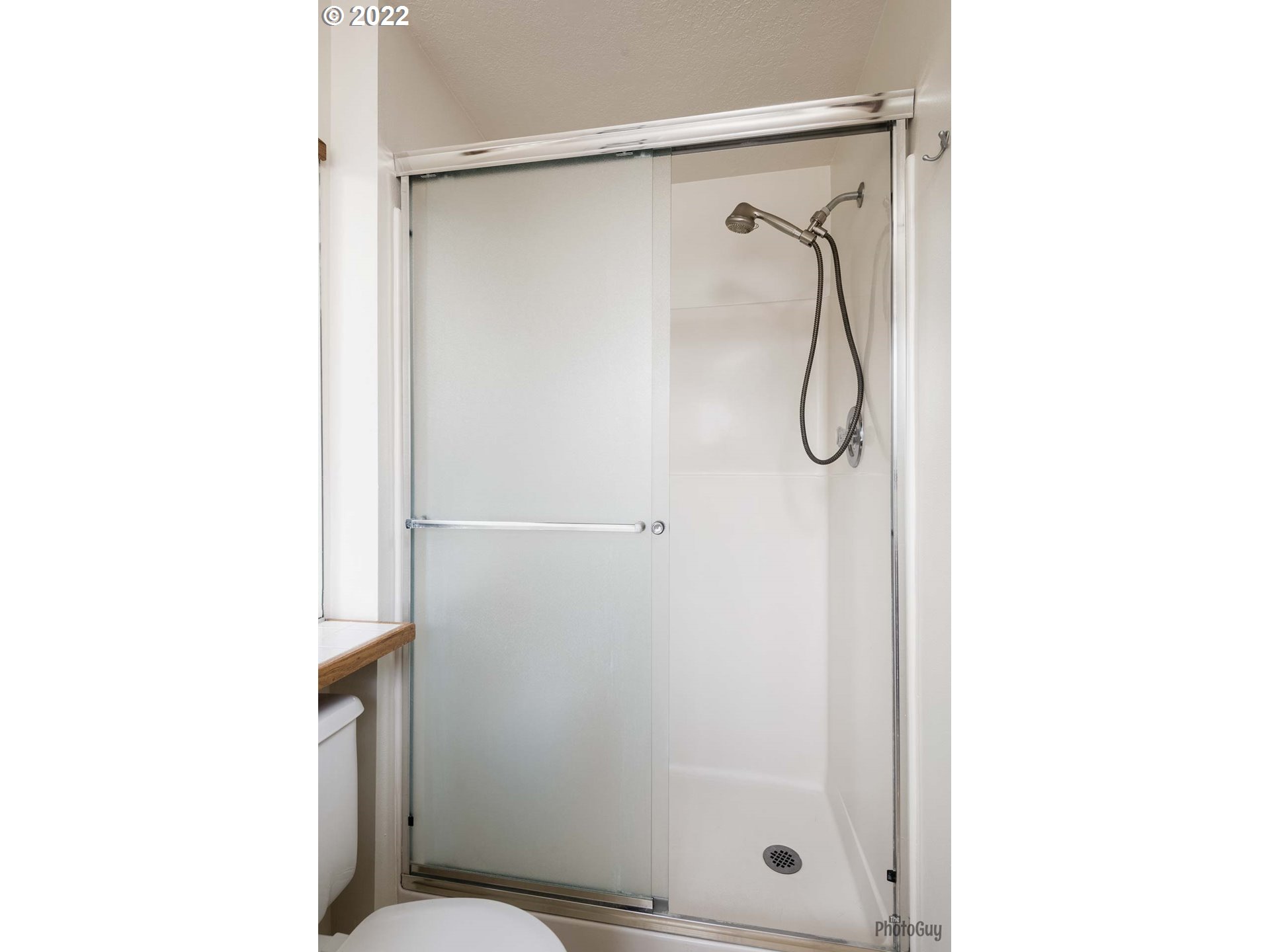 589 Granite Place Springfield, OR 97477 - Photo 16 of 31 a bathroom with a shower