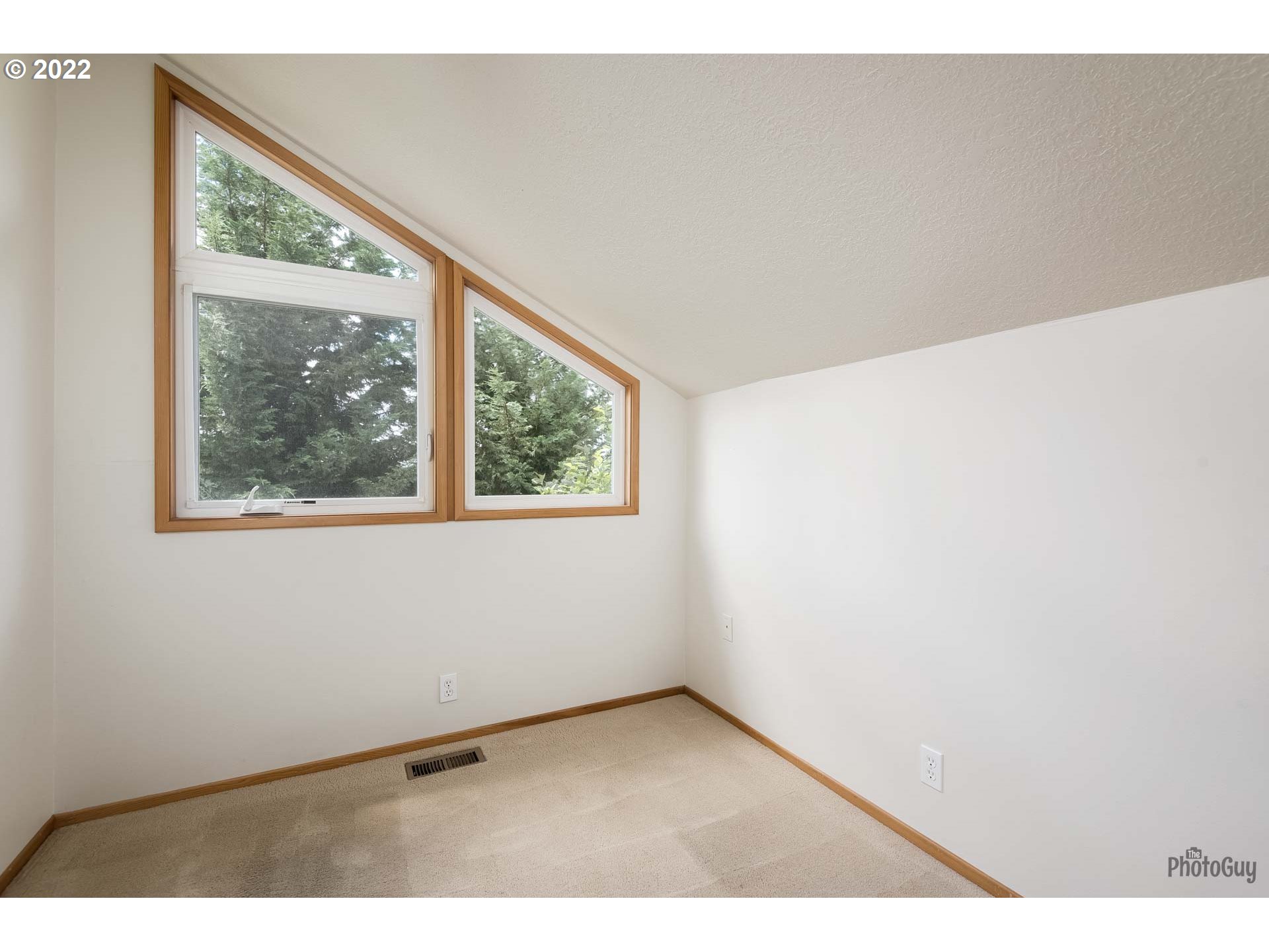 589 Granite Place Springfield, OR 97477 - Photo 21 of 31 a view of an empty room with a window