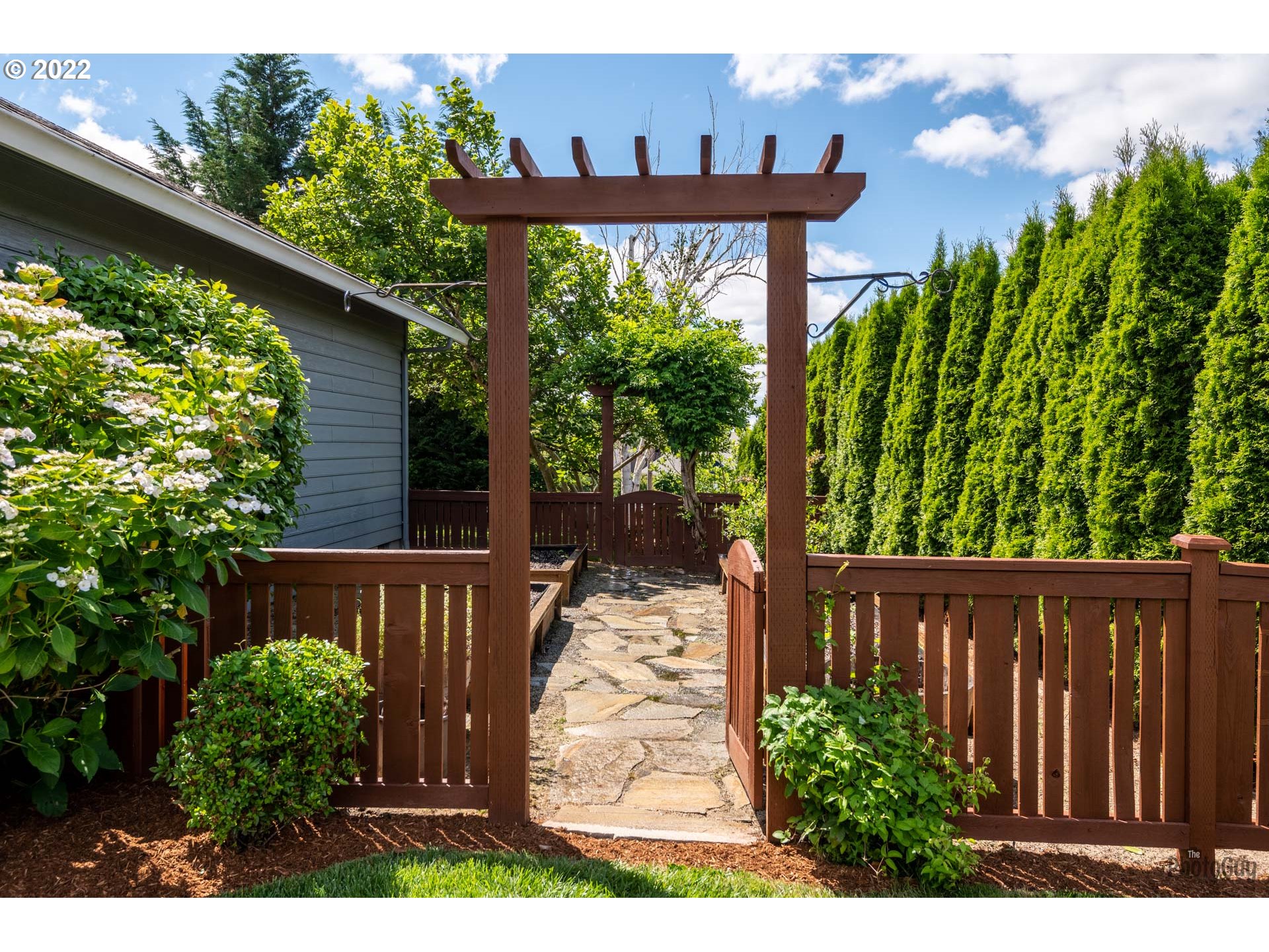 589 Granite Place Springfield, OR 97477 - Photo 24 of 31 a view of a porch with furniture and garden