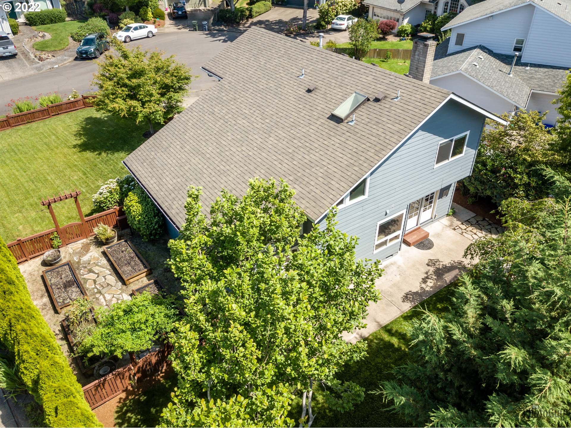 589 Granite Place Springfield, OR 97477 - Photo 30 of 31 an aerial view of a house with a yard and garden