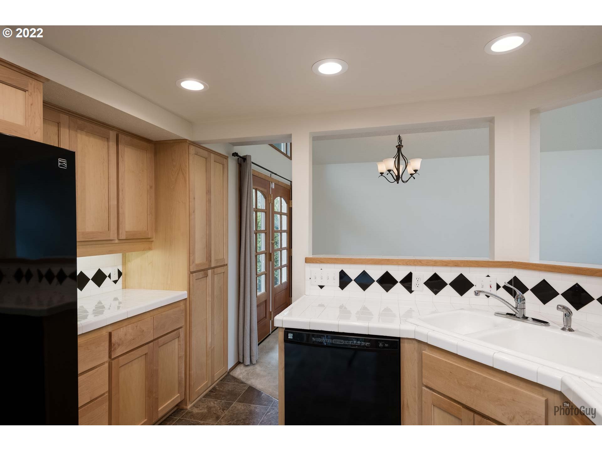 589 Granite Place Springfield, OR 97477 - Photo 9 of 31 a kitchen with a sink and cabinets