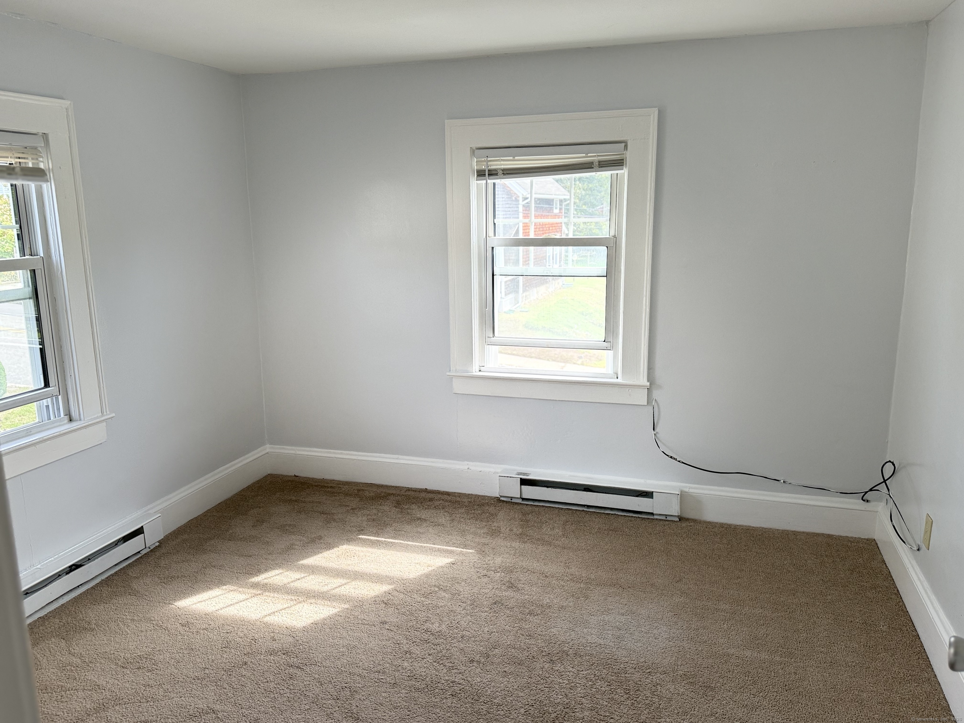 41 Evergreen Avenue, Unit 2 New London, CT 06320 - Photo 4 of 6 an empty room with a window