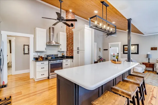 a kitchen with a table and chairs in it