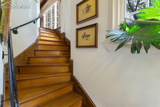 51 Marland Road, Unit A Colorado Springs, CO 80906 - Photo 15 of 50 staircase from living to lower level