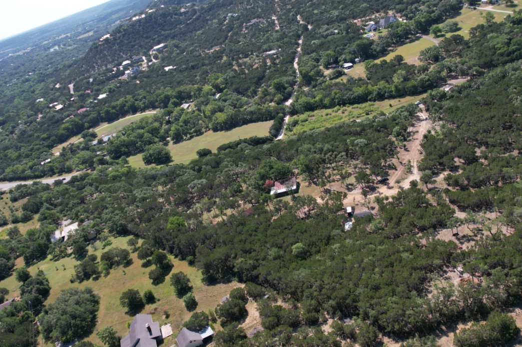 12333 B Ranch Road 12, Unit 2 Wimberley, TX 78676 - Photo 22 of 25 a view of a forest with a tree