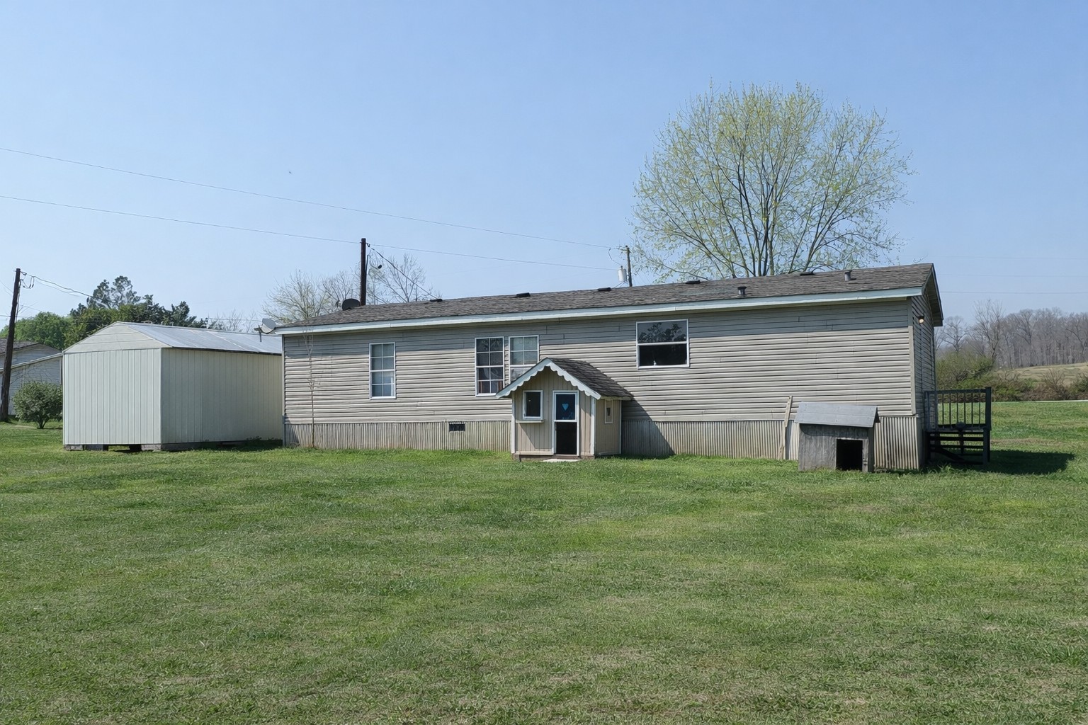 1546 South Bear Creek Road Dickson, TN 37055 - Photo 2 of 2 a view of a house with a yard