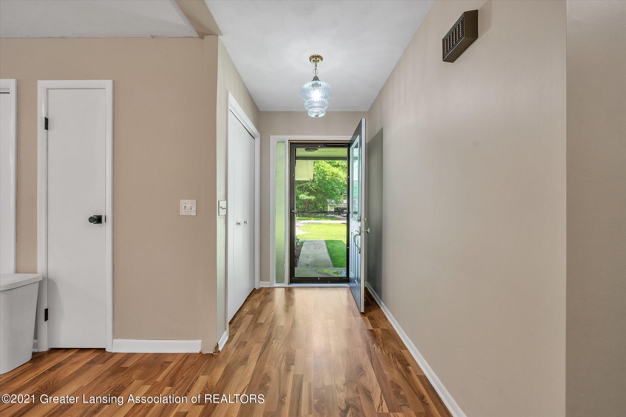 12159 Pine Ridge Drive Perry, MI 48872 - Photo 6 of 40 06-12159-Pine-Ridge-Dr-WindowStill-Real-
