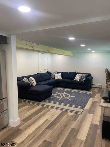 857 East Shore Road West Milford, NJ 07421 - Photo 14 of 31 a living room with lots of furniture and a lamp