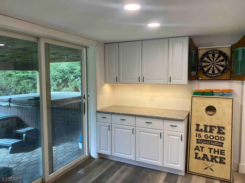 857 East Shore Road West Milford, NJ 07421 - Photo 19 of 31 a kitchen with a cabinets and a stove top oven