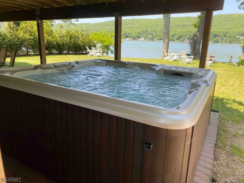 857 East Shore Road West Milford, NJ 07421 - Photo 20 of 31 a view of a living room and window