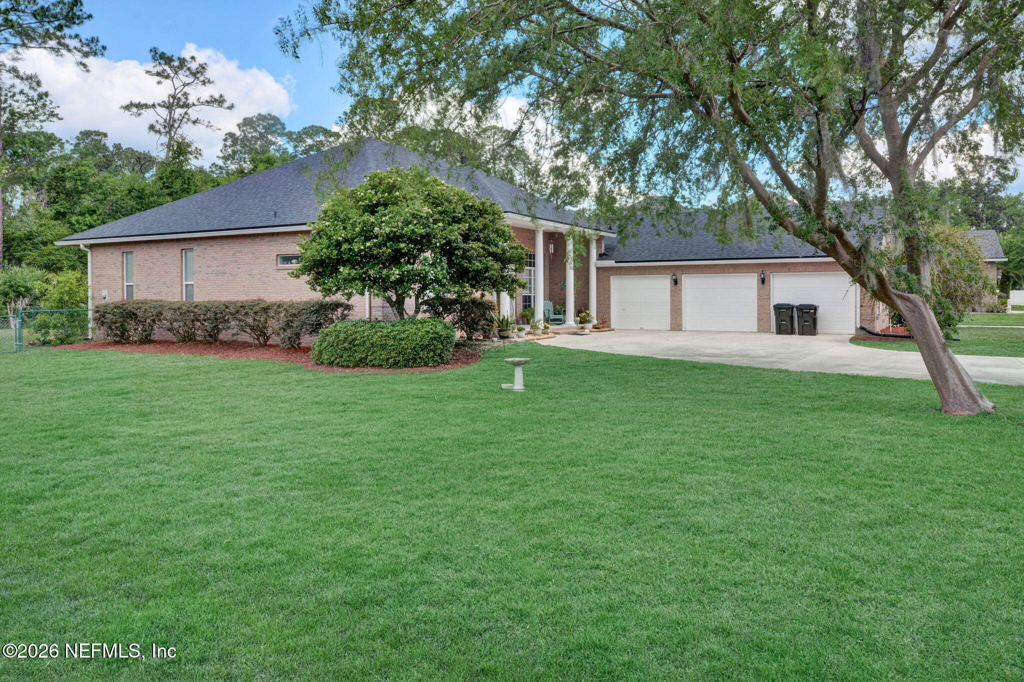 5950 West Shores Road Orange Park, FL 32003 - Photo 31 of 42 a front view of house with yard and green space