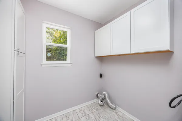 a view of small space with wooden floor