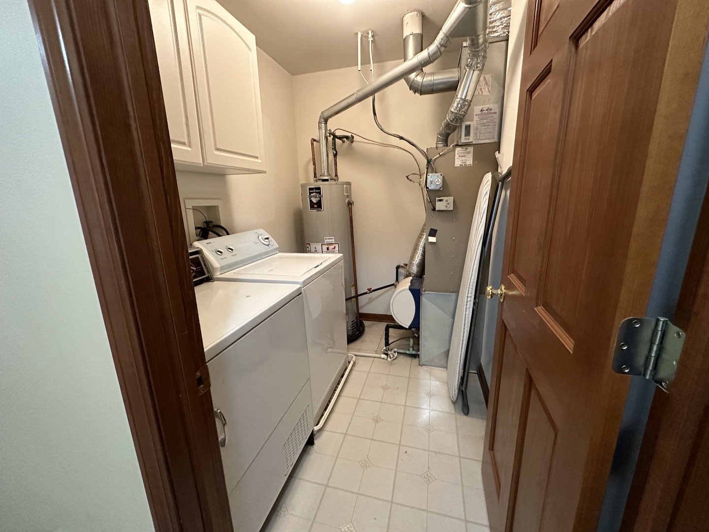 2418 Oneida Lane, Unit 2418 Naperville, IL 60563 - Photo 11 of 15 a utility room with dryer and washer