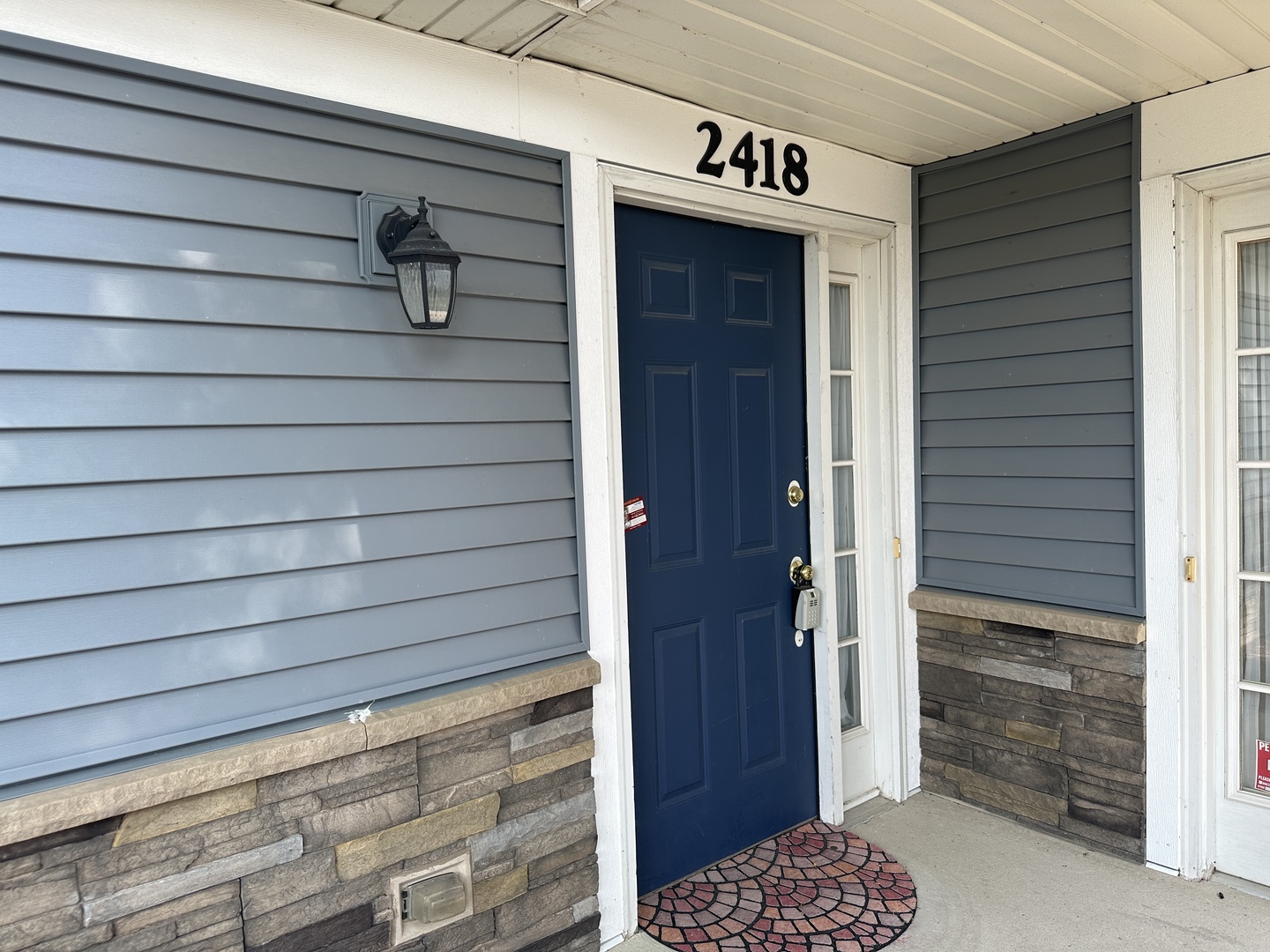 2418 Oneida Lane, Unit 2418 Naperville, IL 60563 - Photo 3 of 15 a view of entryway door of the house