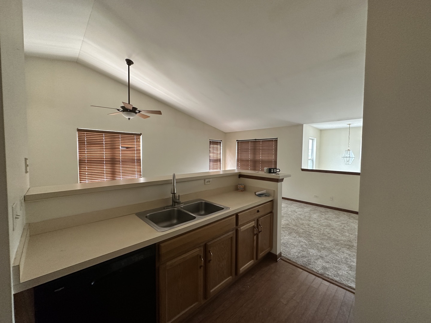 2418 Oneida Lane, Unit 2418 Naperville, IL 60563 - Photo 4 of 15 a kitchen that has a sink and a stove