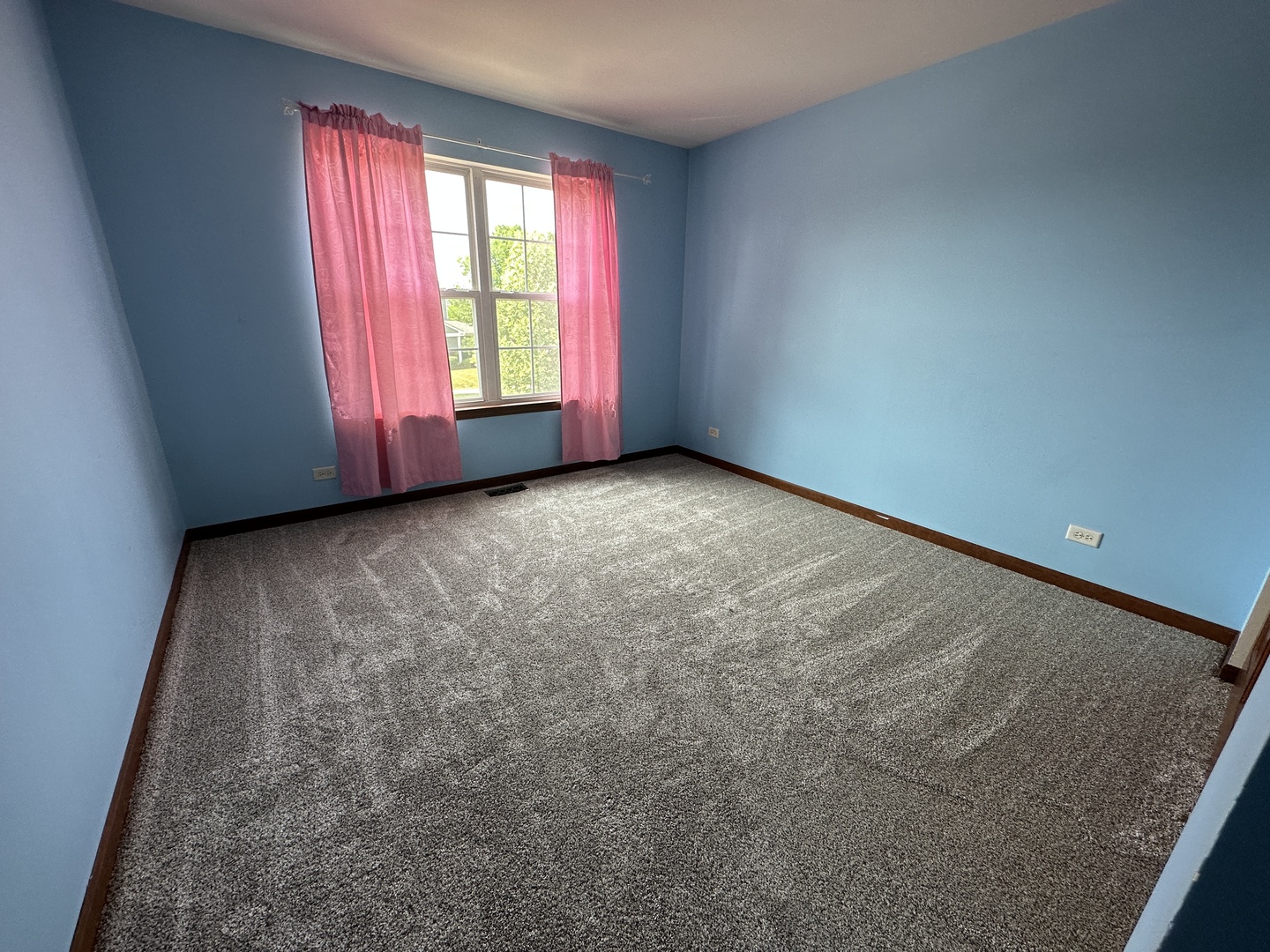 2418 Oneida Lane, Unit 2418 Naperville, IL 60563 - Photo 9 of 15 an empty room with windows