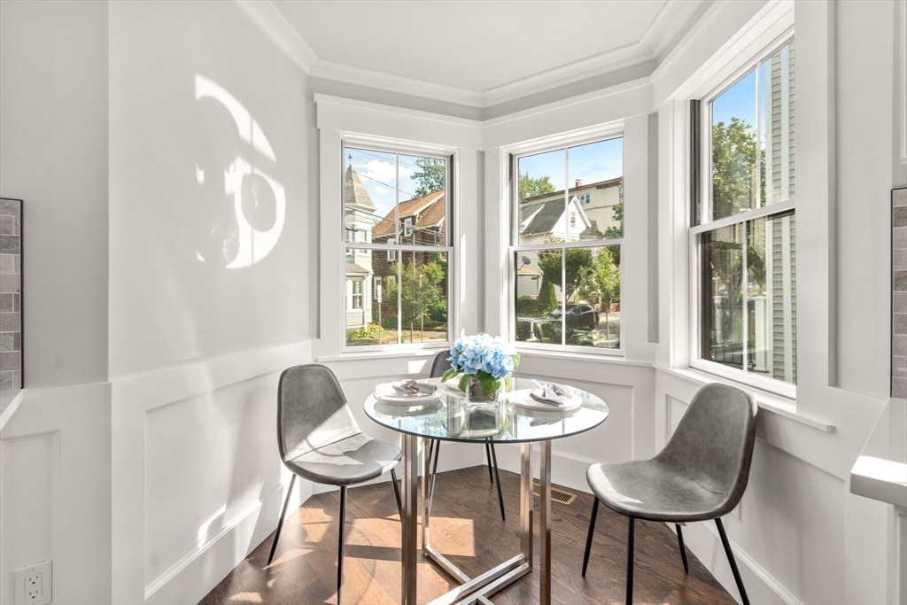 11 Macarthur Street, Unit A Somerville, MA 02145 - Photo 12 of 35 a dining room with furniture and window
