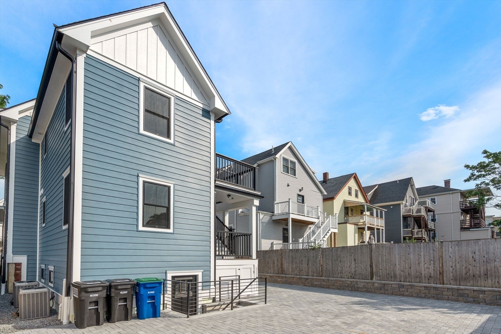 11 Macarthur Street, Unit A Somerville, MA 02145 - Photo 33 of 35 a view of house with backyard and trees