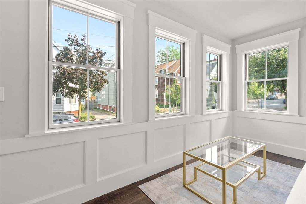 11 Macarthur Street, Unit A Somerville, MA 02145 - Photo 7 of 35 a living room with furniture and a window