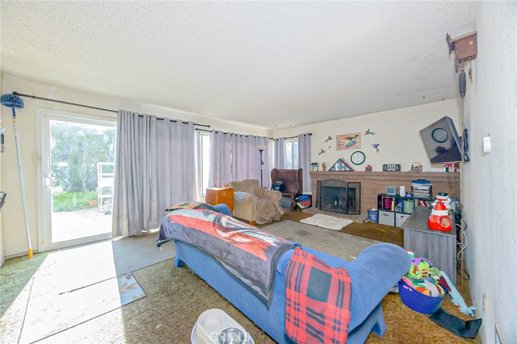 7935 Gardenia Avenue Rancho Cucamonga, CA 91701 - Photo 13 of 35 a bed room with a bed and a window