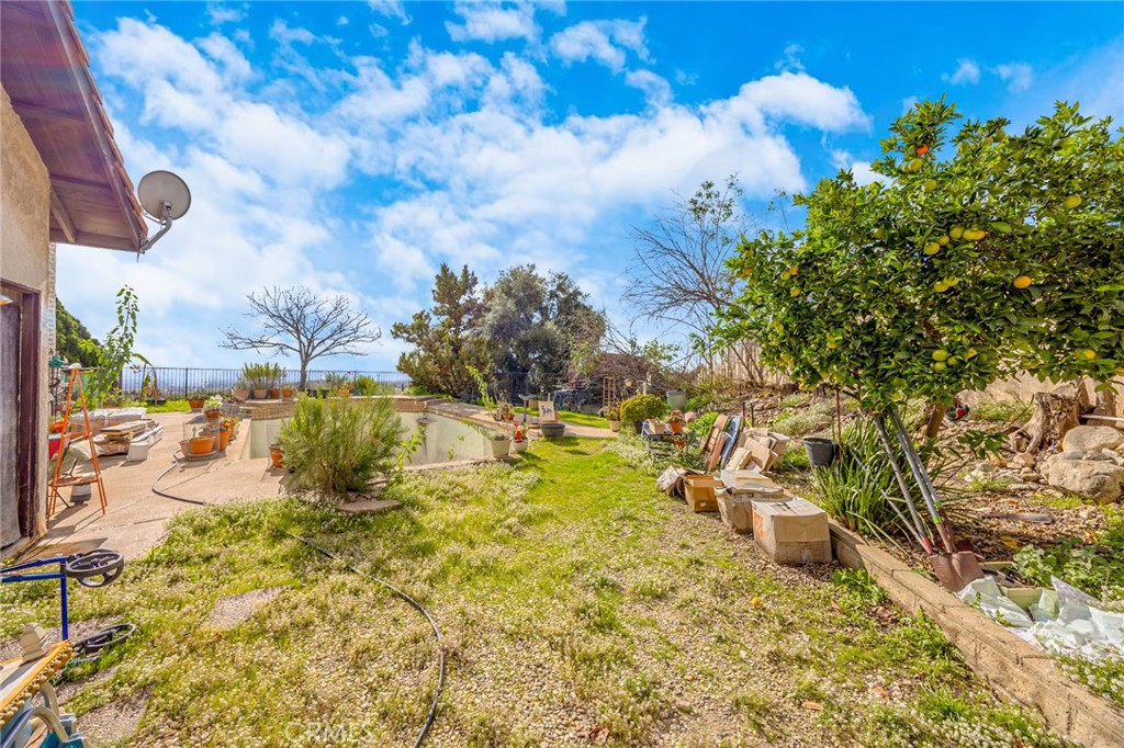 7935 Gardenia Avenue Rancho Cucamonga, CA 91701 - Photo 22 of 35 a view of a yard with an outdoor space