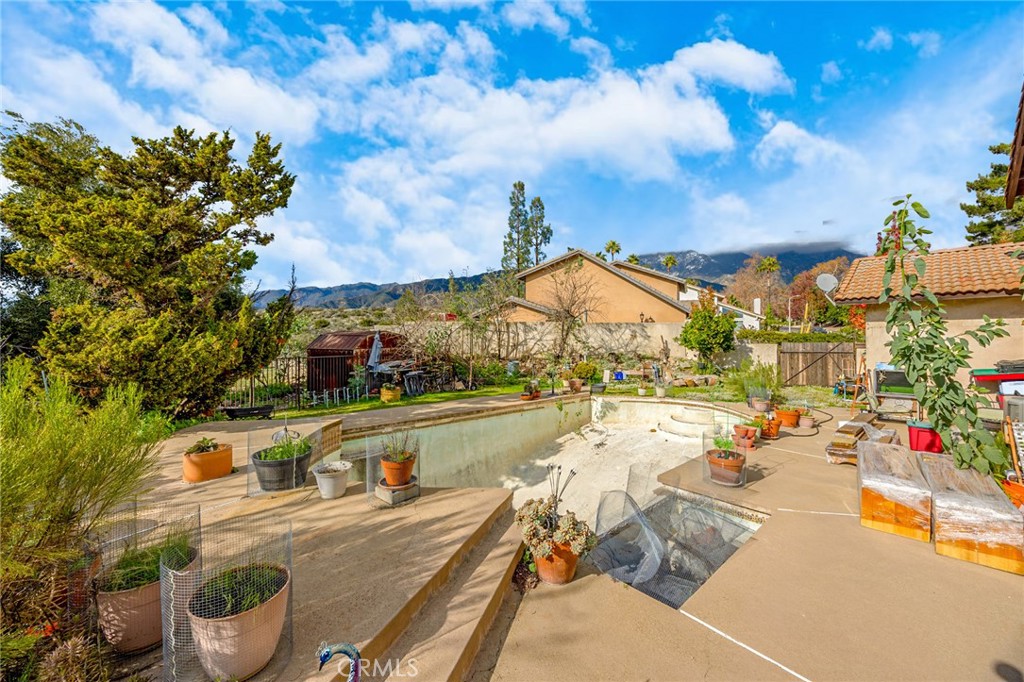 7935 Gardenia Avenue Rancho Cucamonga, CA 91701 - Photo 24 of 35 a view of yard along with trees
