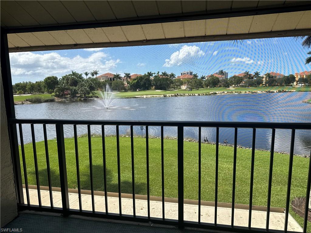a view of lake with a balcony