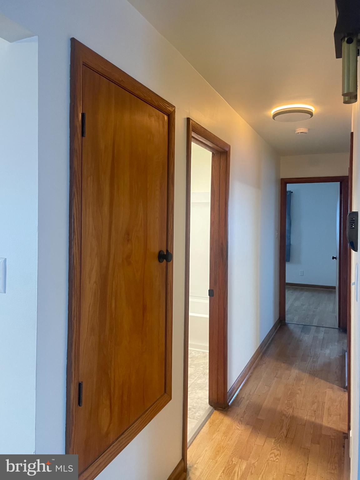 230 Armstrong Avenue Frostburg, MD 21532 - Photo 13 of 30 Inviting hallway with warm wooden accents.