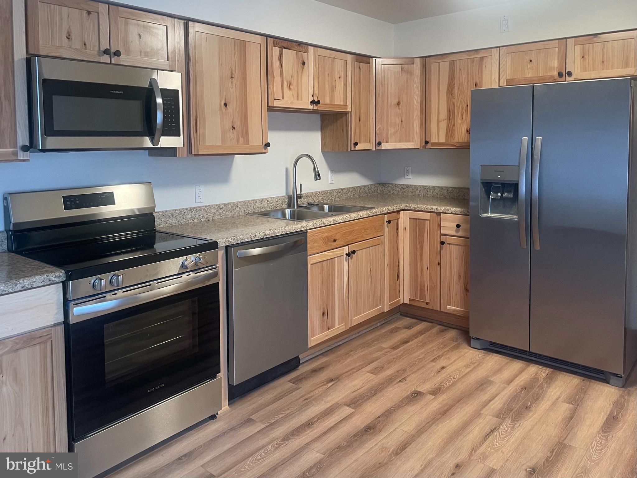 230 Armstrong Avenue Frostburg, MD 21532 - Photo 7 of 30 Modern kitchen with sleek appliances.