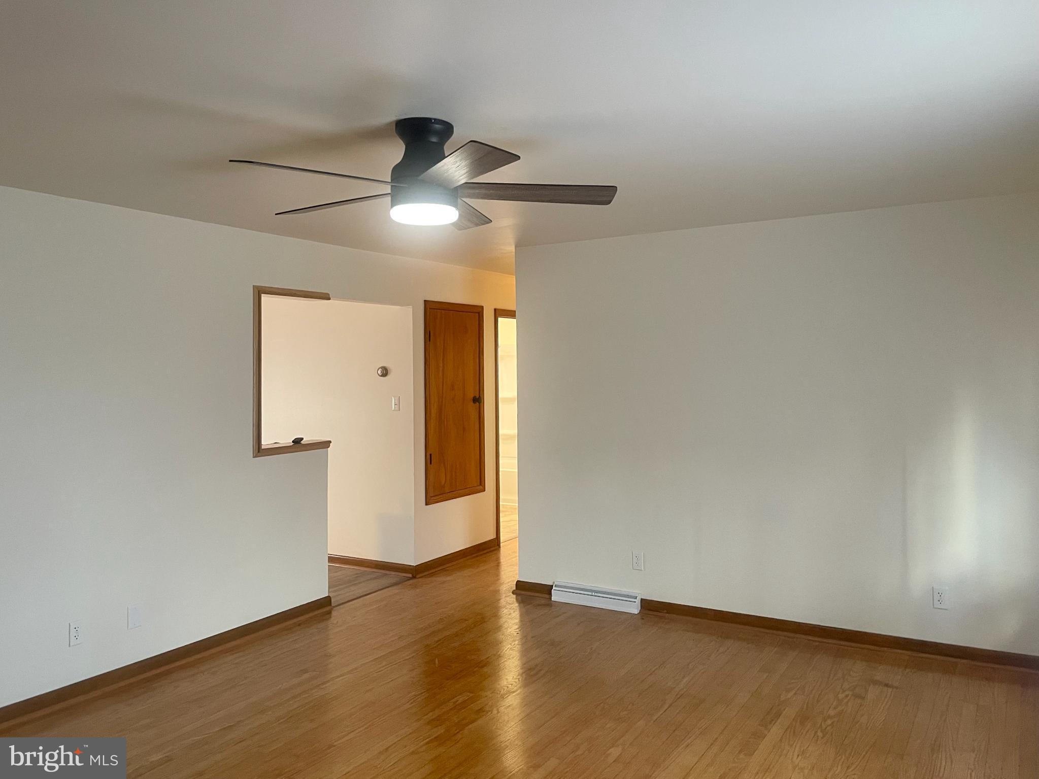230 Armstrong Avenue Frostburg, MD 21532 - Photo 9 of 30 Spacious living area with natural light.