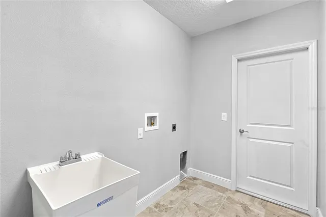 a bathroom with a sink toilet and vanity