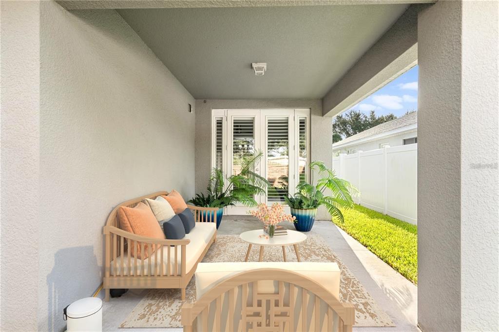 2812 Roseglen Way Orlando, FL 32812 - Photo 17 of 20 a living room with furniture and a large window