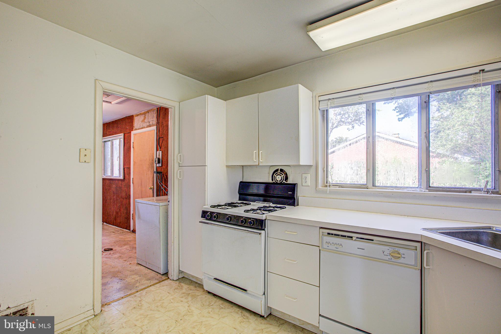 7420 Axton Street Springfield, VA 22151 - Photo 13 of 46 kitchen opens to laundry room