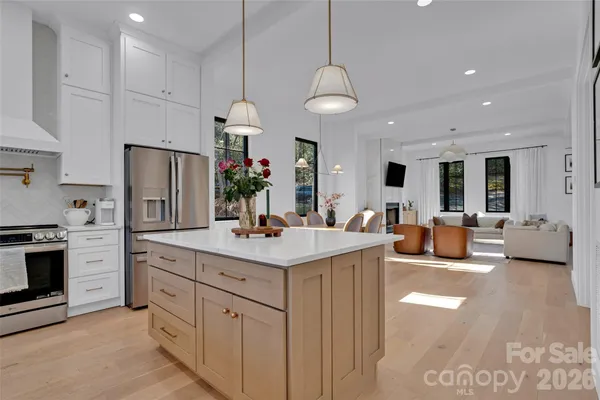 a view of a balcony with chair and wooden floor